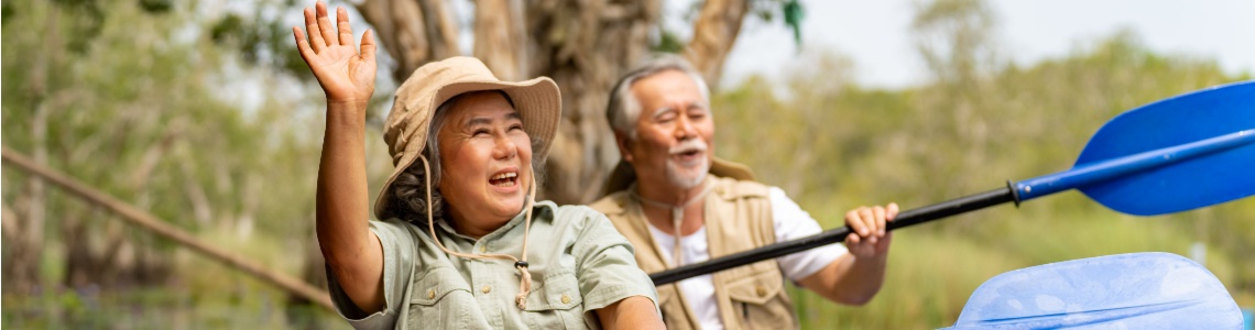 An older couple kayaking.