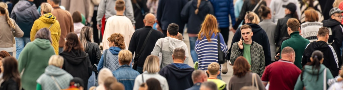A crowd of people walking.